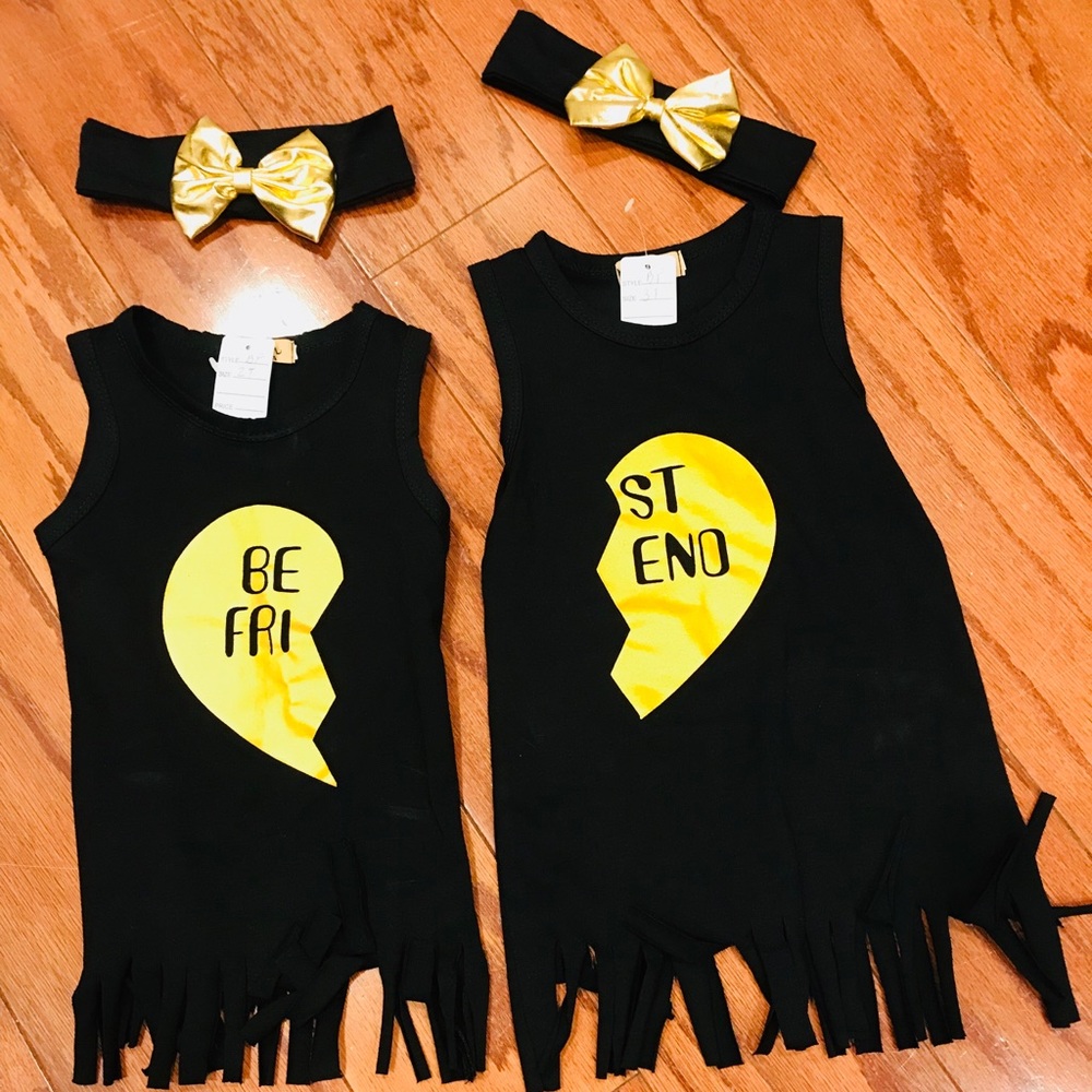 Two toddler girl matching dresses w headband.